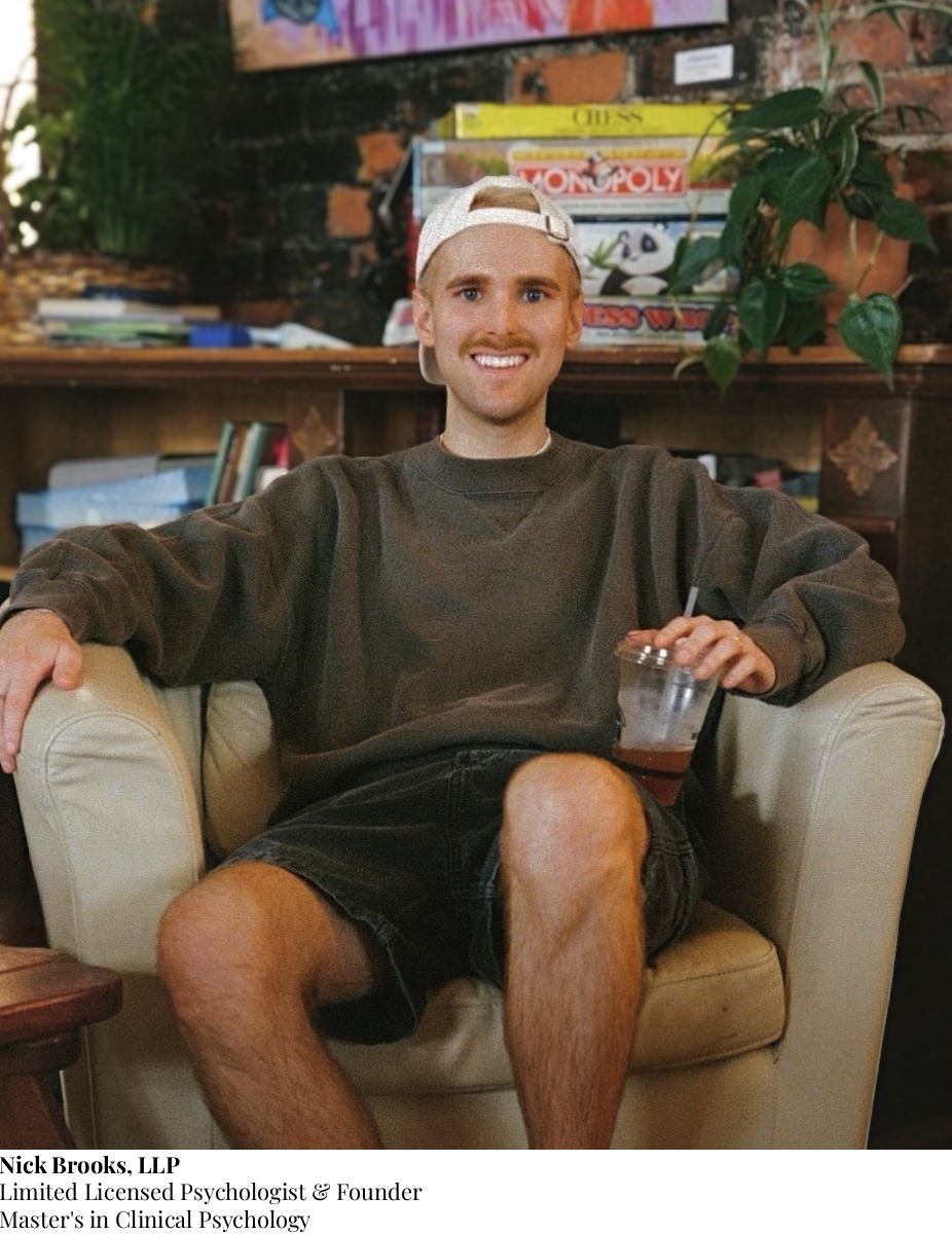 photo of therapist sitting in chair, smiling